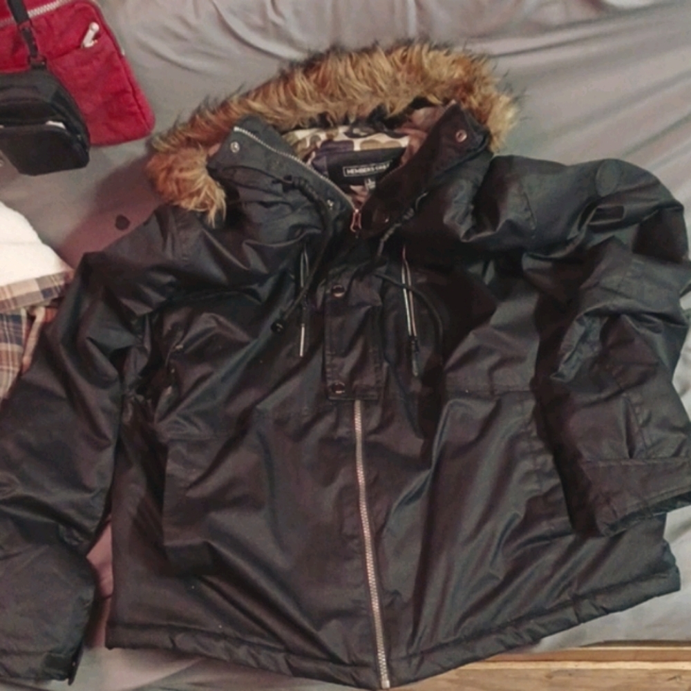 I am selling this super stylish modern Eskimo coat